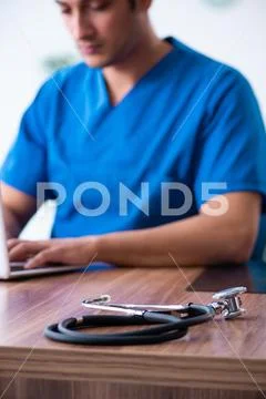 Young male doctor in telehealth concept Stock Photos