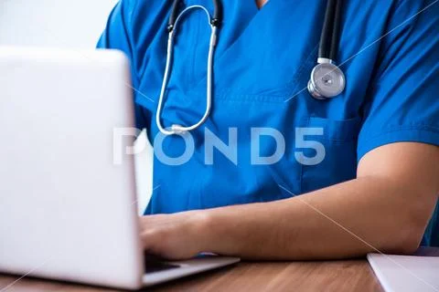 Young male doctor in telehealth concept Stock Photos