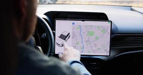 Young Male Engineer Designing Interactive Touch Screen Dashboard For Electric 스톡 사진