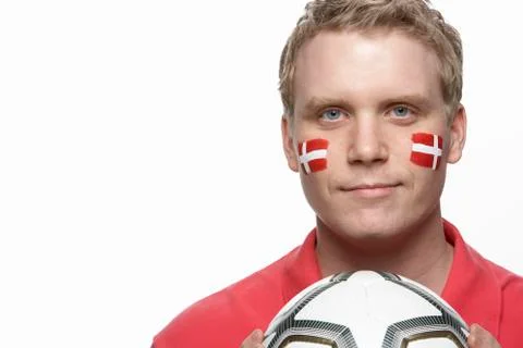 Young Male Football Fan With Danish Flag Painted On Face Stock Photos