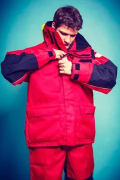 Young male getting dressed. Stock Photos