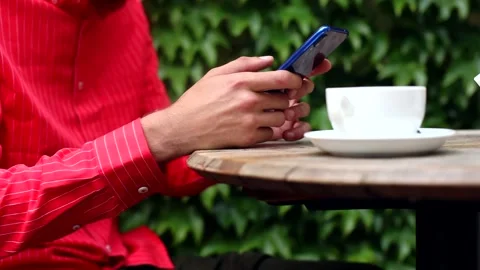 Young male hands using smartphone closeup. Stylish businessman searching online  Видео 132548582