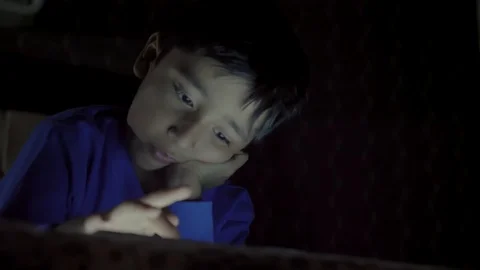 A young male kid using a creative painting app on a tablet Stock Footage 124340162