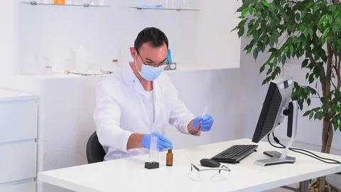 Young male lab worker in the workplace Stock Footage 117311773