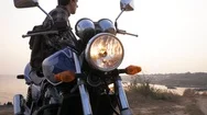 Young Male On Motorbike Stock Footage