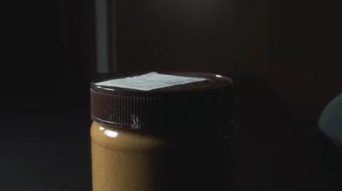 Young Male Opens A Jar Of Peanut Butter Side-Shot Stock Footage 34163618
