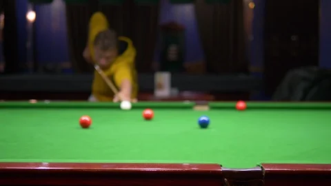 Young male professional pool player playing snooker. Stock Footage 117257544