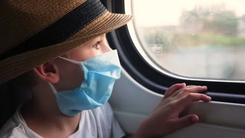 Young male in protective mask while traveling by train. Prevention from COVID-19 動画素材 137670767