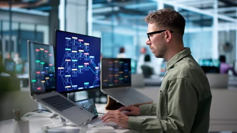 Young Male Software Developer Using Low Code Platform Stockbeeldmateriaal 342963056