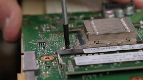 Young male tech or engineer repairs electronic equipment in research facility. Stock Footage 158695004