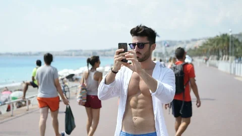 Young male tourist exploring Nice, France Stock Footage 101808603