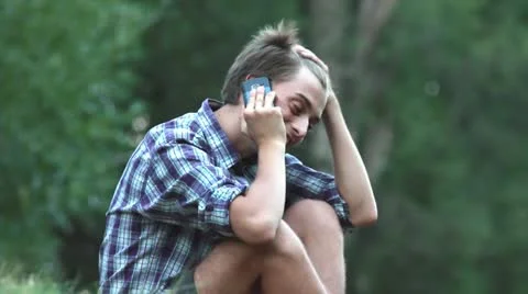 Young Male using Cell Phone outdoors Video stock 11895344