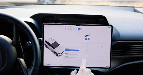 Young Male Using A Smart Touch Screen Dashboard. 스톡 사진