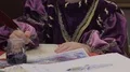 Young male writing billet-doux letter with quill, costume party of Medieval Ages HD Footage