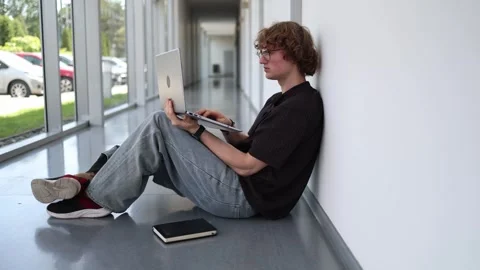 Young man absorbed in computer gaming Stock Footage 338277114