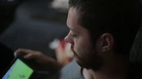 Young Man Addicted to Handheld Video Games Stock Footage 76691230