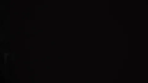 Young man admire view from window at home and put on a shirt. Slow motion Stock Footage 95993027