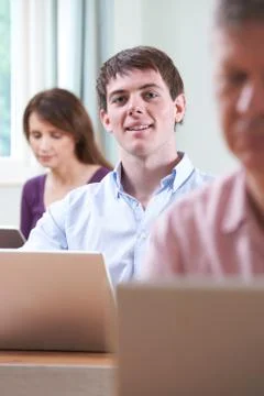 Young Man In Adult Education Class Stock Photos