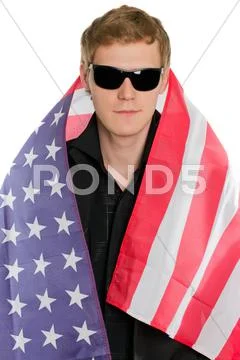 Young man in the American flag Stock Photos