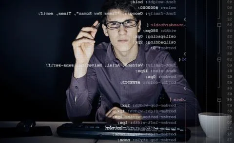 Young Man Analyzing His Css Definitions 스톡 사진