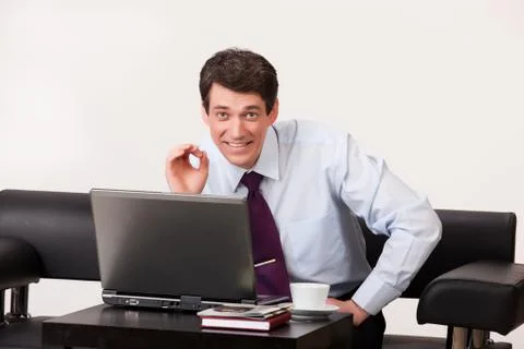 Young Man And Computer Stock Photos
