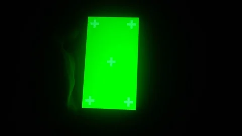 A young man and a green screen smartphone Stock Footage 82134073