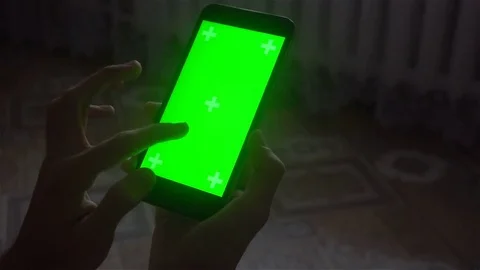 A young man and a green screen smartphone Stock Footage 82145606