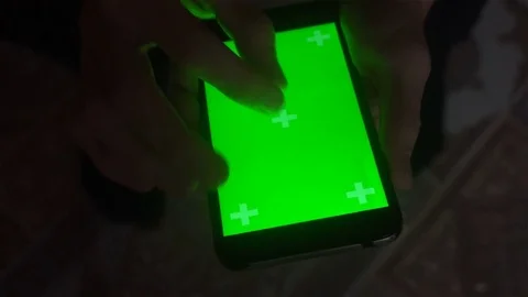 A young man and a green screen smartphone Stock Footage 82146500