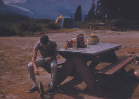 Young man and squirrel Stock Photos