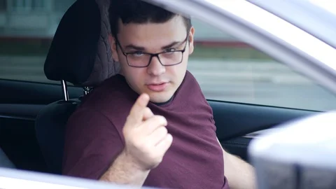 Young man angry in car Stock Footage 126087162