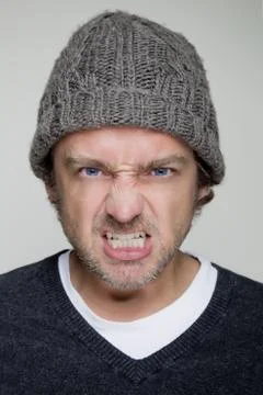 Young man with an angry expression Stock Photos