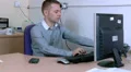 Young man answers his work phone HD Footage