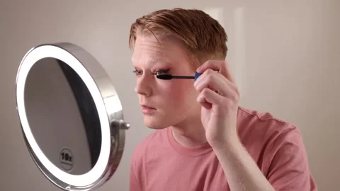 Young Man Applying Mascara Makeup Routine Beauty Closeup Stock Footage 310034512