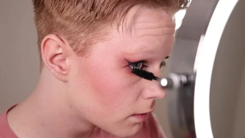 Young Man Applying Mascara Makeup Routine Beauty Closeup Stock Footage 310034891