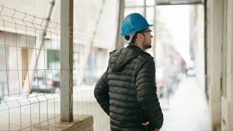 Young man architect standing with arms crossed gesture at street Video stock 170633738