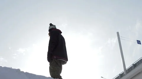 Young man on a background of the sun in winter Video stock 64508382