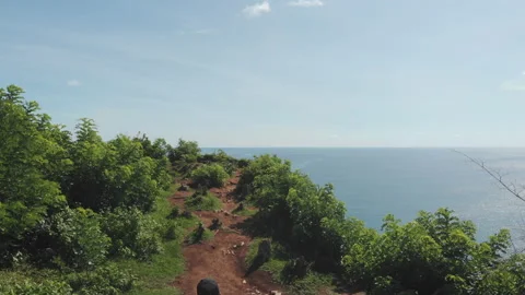 Young man with backpack on mountain Video stock 130716783