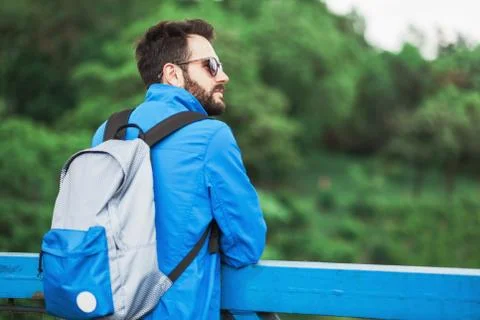Young man with a backpack Stock Photos