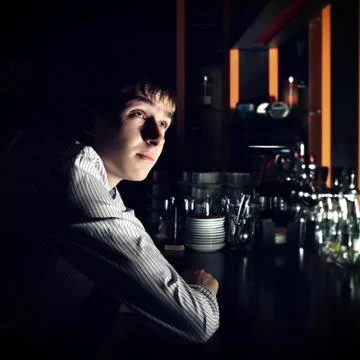 Young Man at the Bar Stock Photos