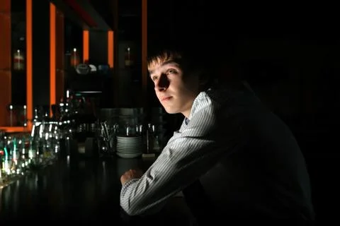 Young Man at the Bar Stock Photos