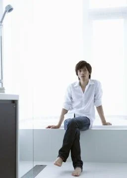 Young man in bathroom Stock Photos