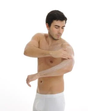 Young man in the bathroom Stock Photos