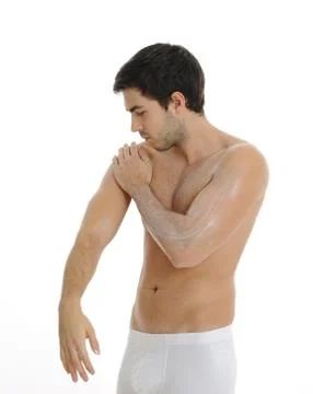 Young man in the bathroom Stock Photos