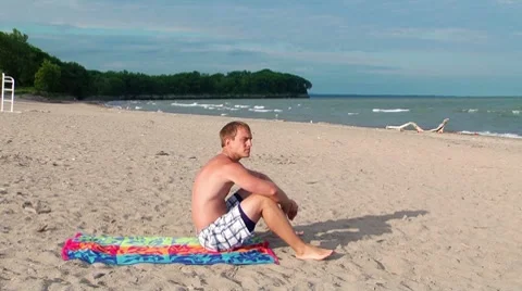 Young Man on Beach Stock Footage 7899141