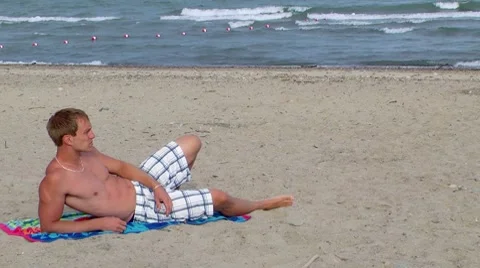 Young Man on Beach Video stock 7899249