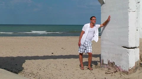 Young Man on Beach Video stock 7899447