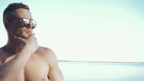 Young man on a beach Stock Footage 89289084