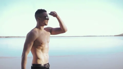 Young man on a beach 스톡 동영상 89289174