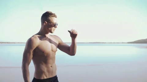 Young man on a beach 스톡 동영상 89289235