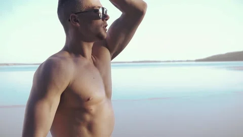 Young man on a beach Stock Footage 89289306